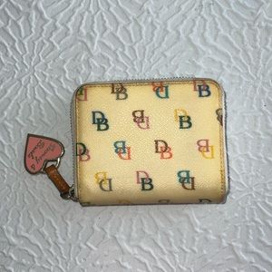 Dooney and Bourke wallet with tri colored zip with signature DB logo on outside